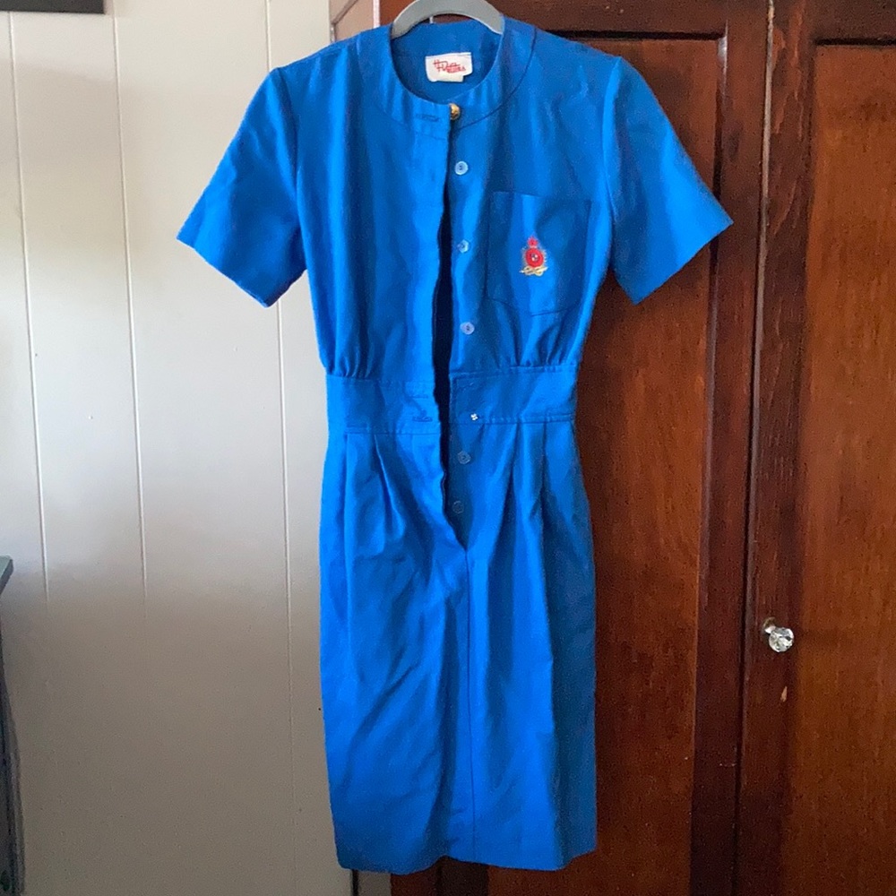 Vintage dress with little insignia